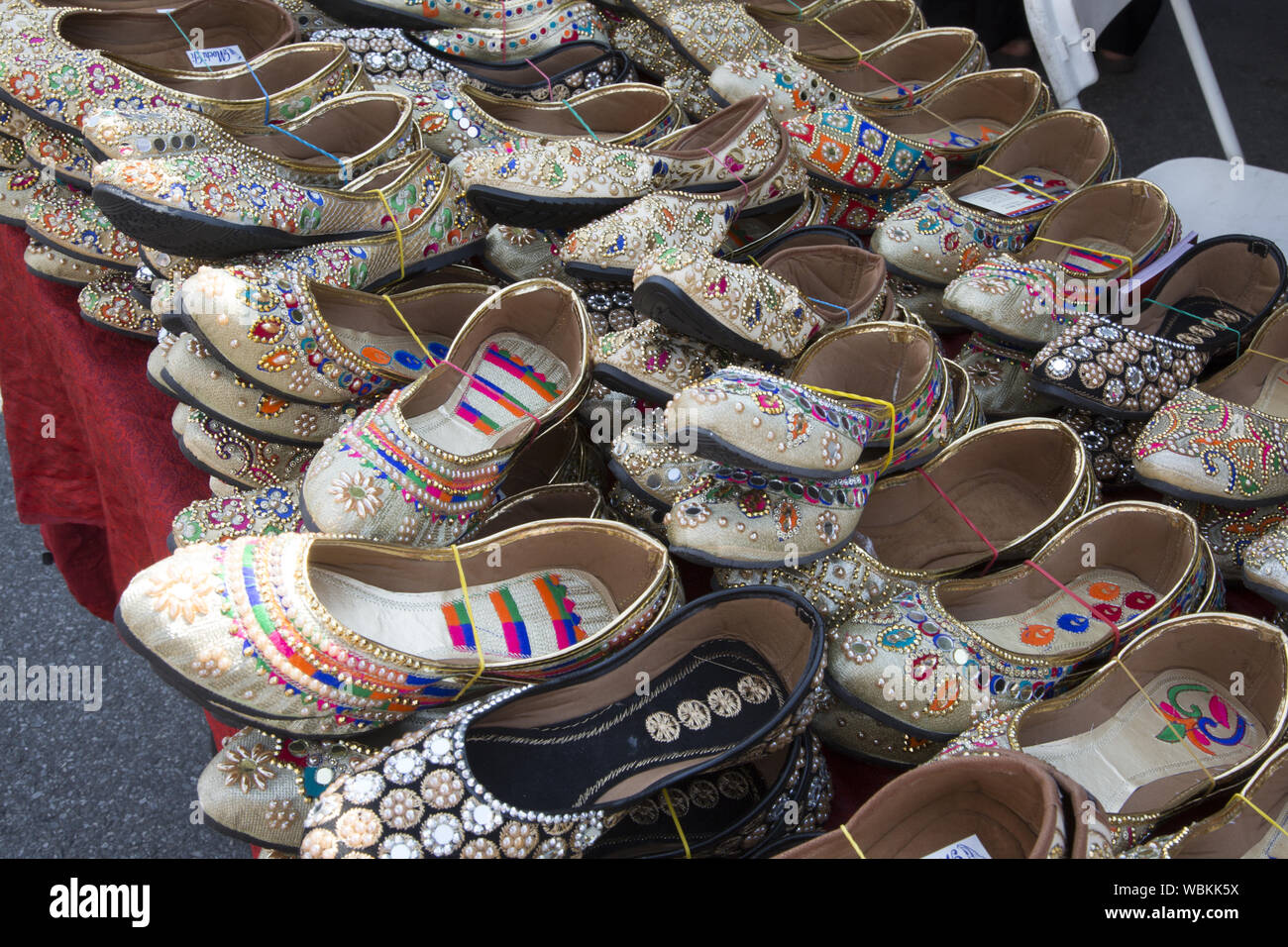 Women's slippers for sale by a vendor at a Bangladeshi Street Fair on  McDonald Avenue in the section of the Kensington neighborhood known as  "Little Bangladesh Stock Photo - Alamy