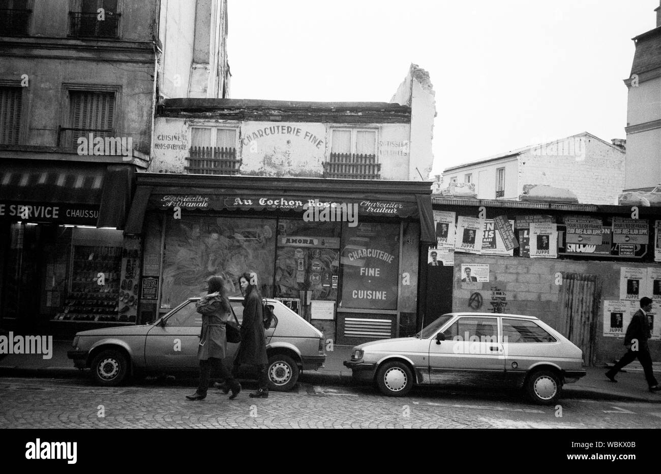 PARIS MONTMARTRE - 'THE PINK PIG' - OLD BUILDINGS UNDER DEMOLITION PROSPECT IN THE AREA OF PLACE DES ABBESSES PARIS MONTMARTRE IN THE LATE 80'S - PARIS STREET PHOTOGRAPHY - SILVER FILM © Frédéric BEAUMONT Stock Photo