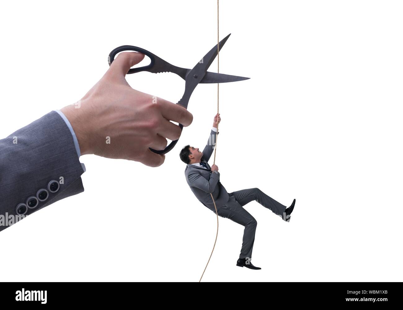 The hand cutting rope in business risk concept Stock Photo - Alamy