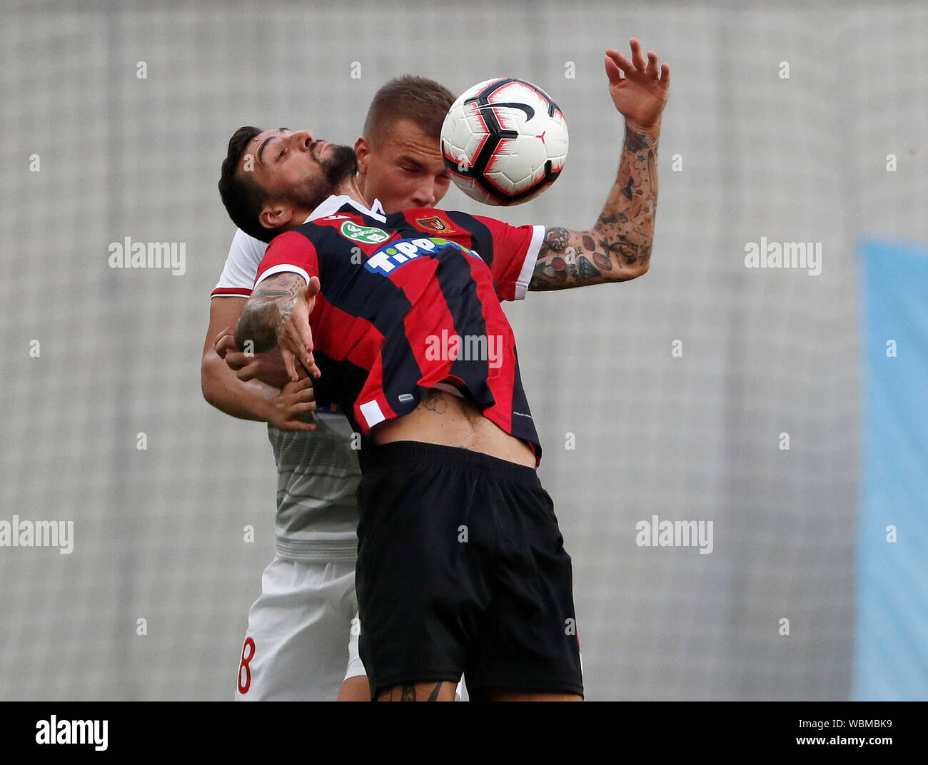 BUDAPEST, HUNGARY - AUGUST 24: Attila Haris of DVSC #18 battles for the ball in the air with Davide Lanzafame of Budapest Honved during the Hungarian OTP Bank Liga match between Budapest Honved and DVSC at Nandor Hidegkuti Stadium on August 24, 2019 in Budapest, Hungary. Stock Photo