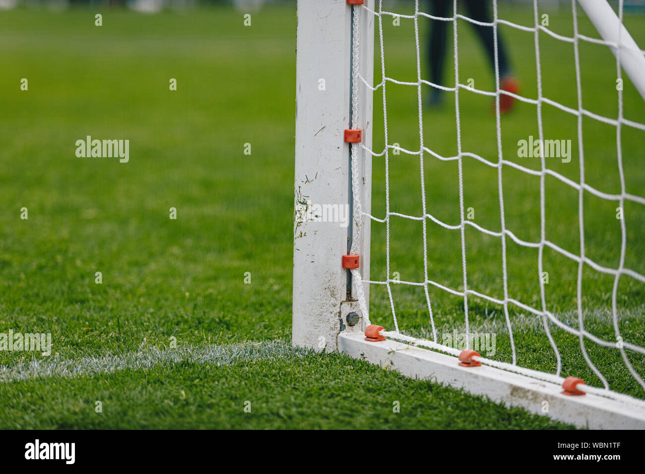 Football Soccer Goal Post Of Football Goal And White Net In The Foreground Soccer Stadium In The Background Summer Sunny Day Stock Photo Alamy Football Soccer Goal Post Of Football Goal And White Net In The Foreground Soccer Stadium In The Background Summer Sunny Day Stock Photo Alamy