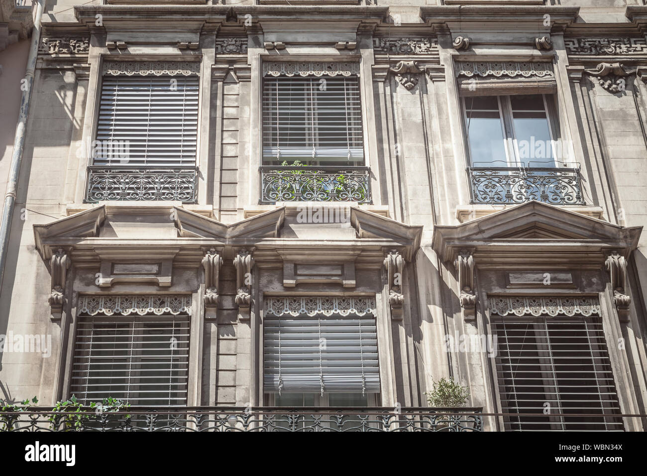 Typical Haussmann style facades, from the 19th century, traditional in the city centers of French cities such as Paris and Lyon, with their traditiona Stock Photo
