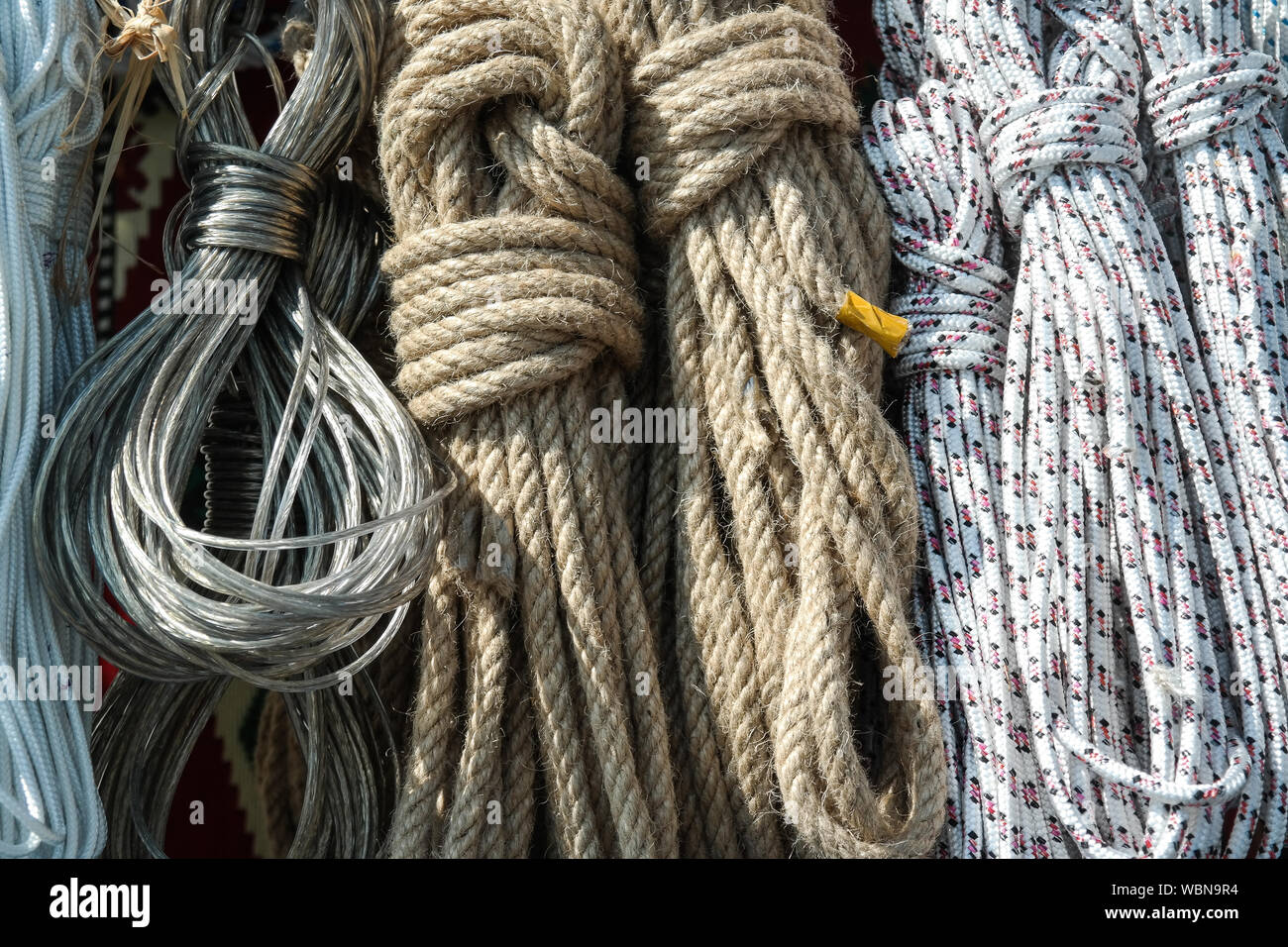 Rope background. roll of different ropes Stock Photo