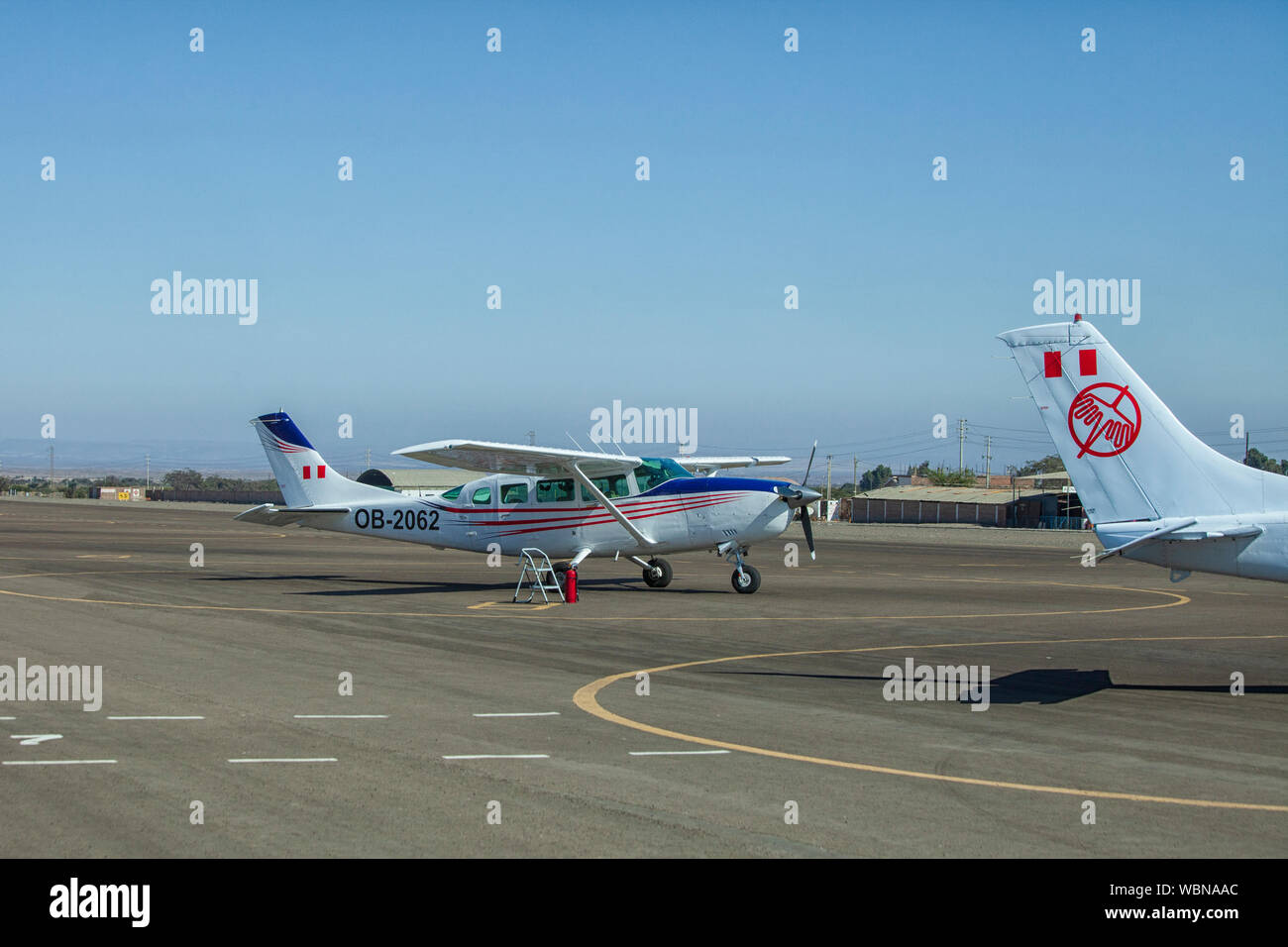 Airplanes waiting for passengers on airport Nazca. Flight over the Nazca lines, Nazca, Peru, South America Stock Photo