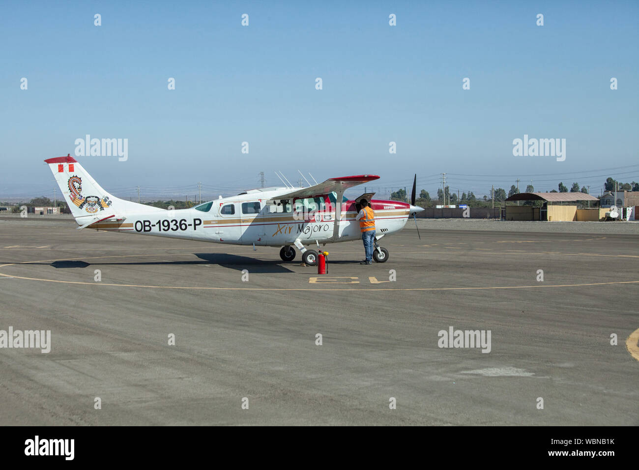 Airplanes waiting for passengers on airport Nazca. Flight over the Nazca lines, Nazca, Peru, South America Stock Photo