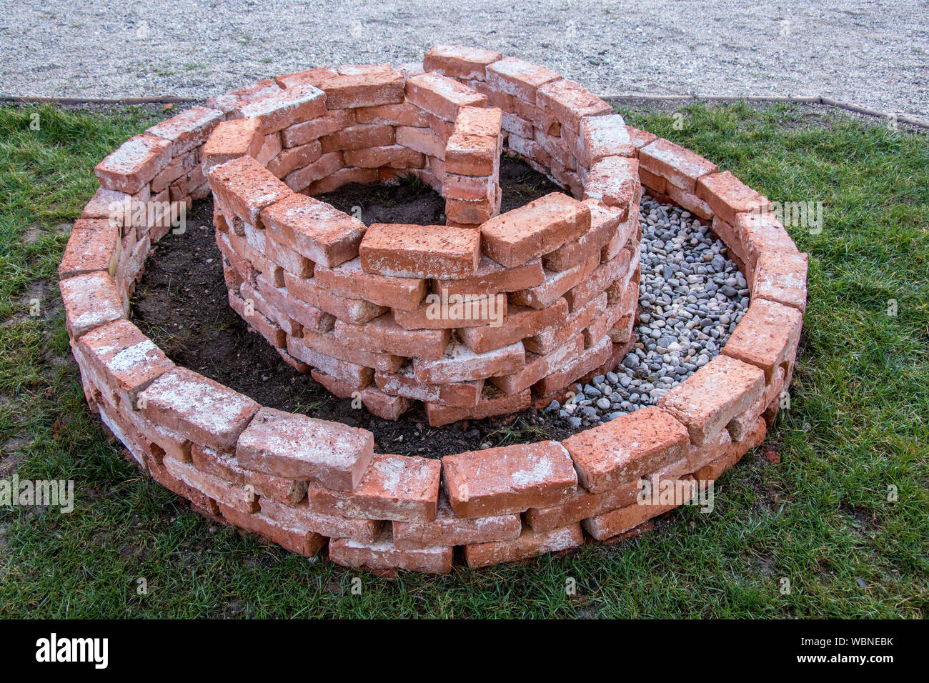finished spiral herb garden on yard Stock Photo Alamy