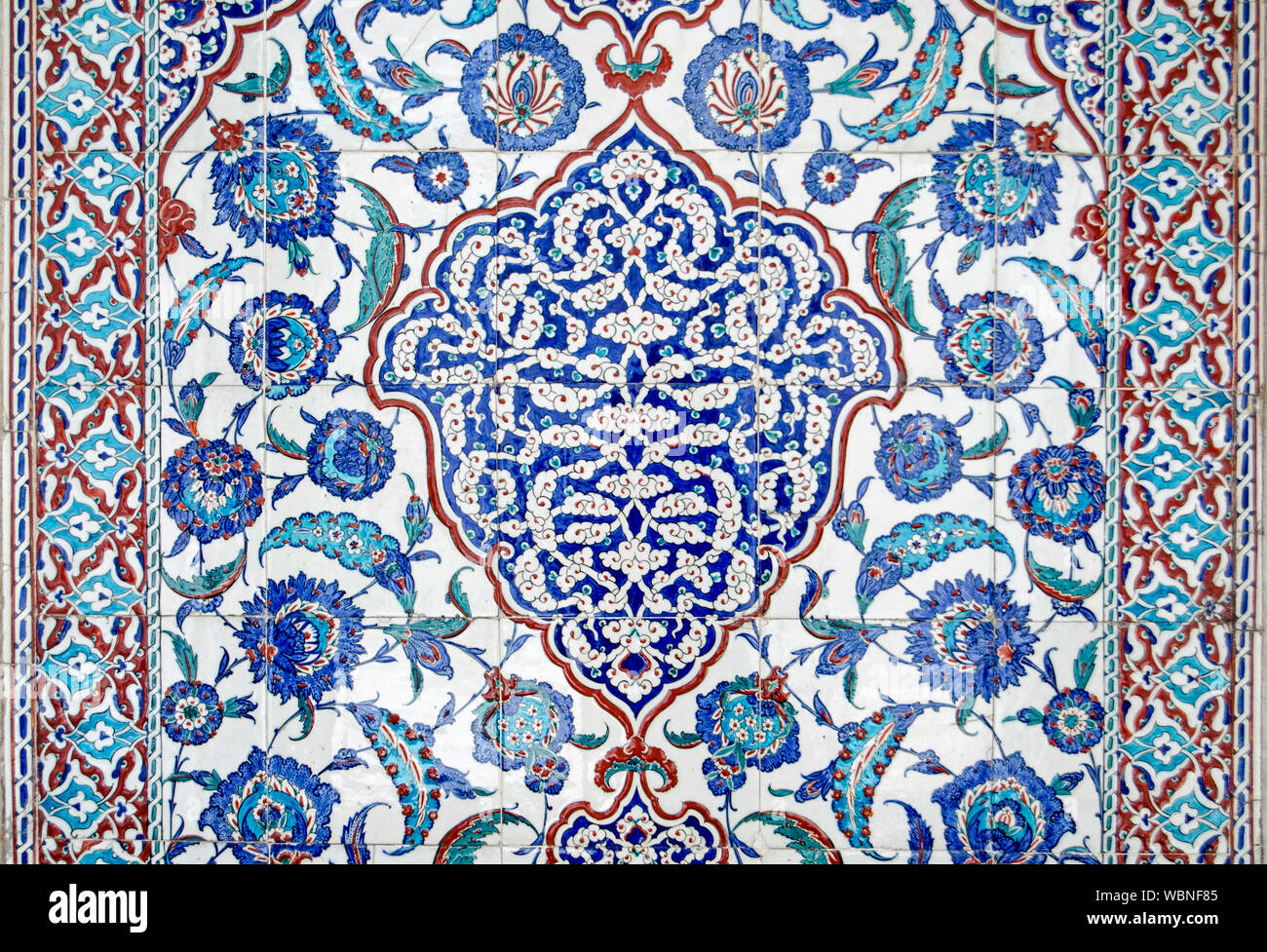 Detail of a wonderful pattern made in Iznik tiles on the exterior of the historic tomb of Sultan Murad III built in 1599.  On public display Stock Photo