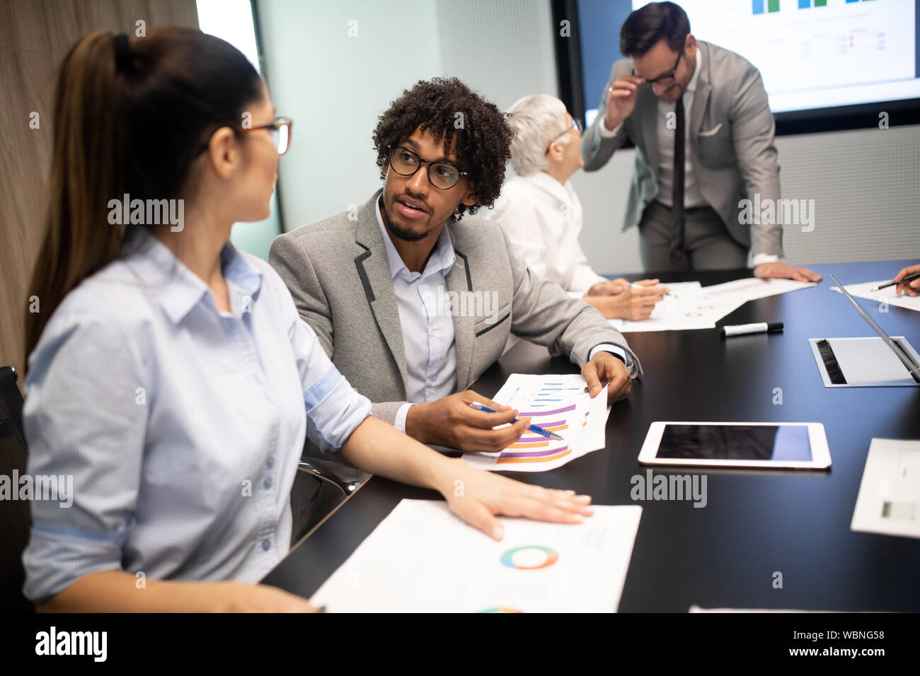 Group of successful business people at work in office Stock Photo - Alamy