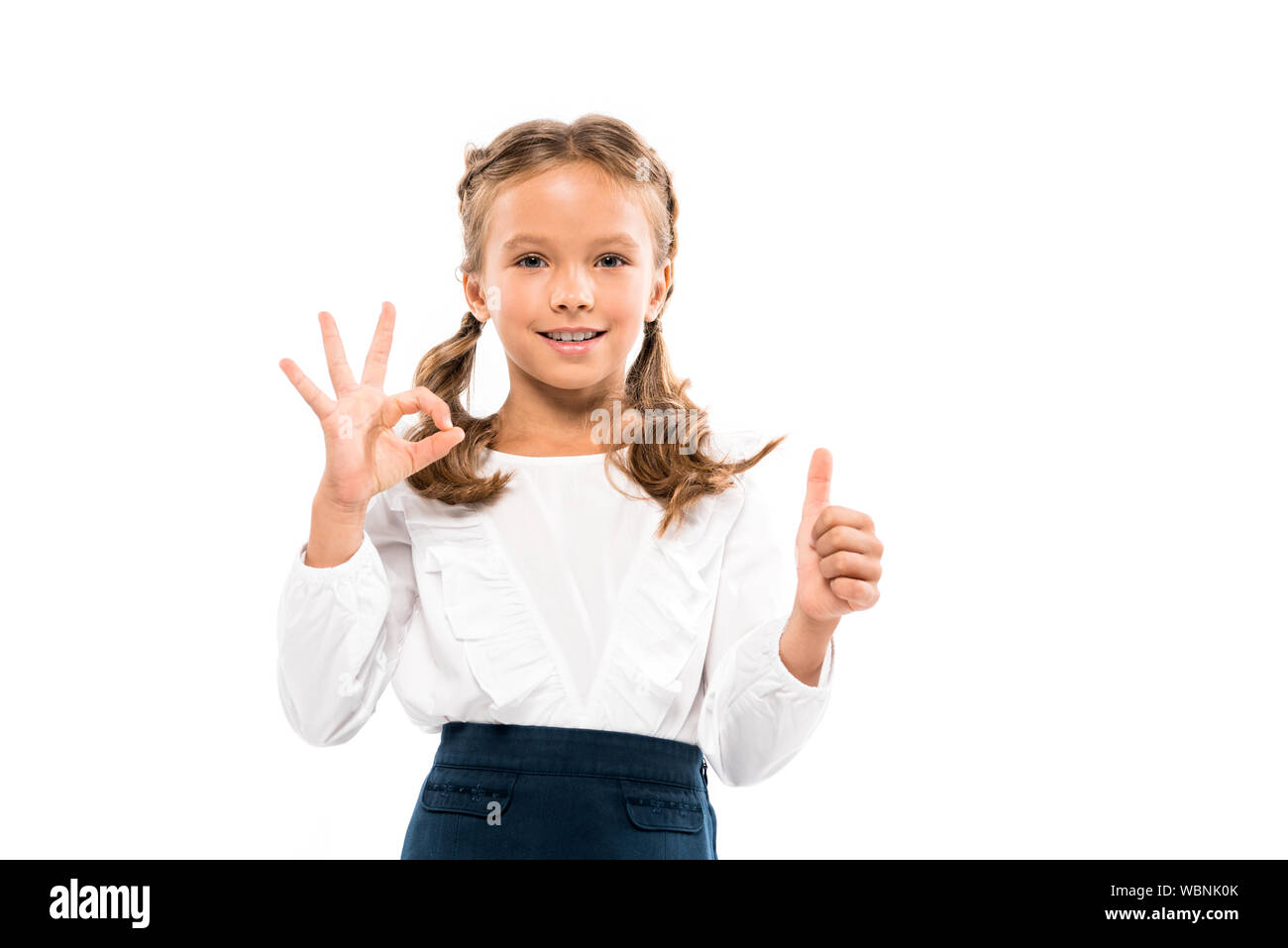 happy kid showing thumb up and ok sign isolated on white Stock Photo ...