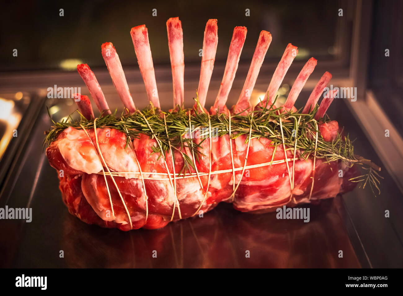 Raw fresh uncooked Pork Meat steak on bone, Raw pork Meat steak on steel tray Stock Photo