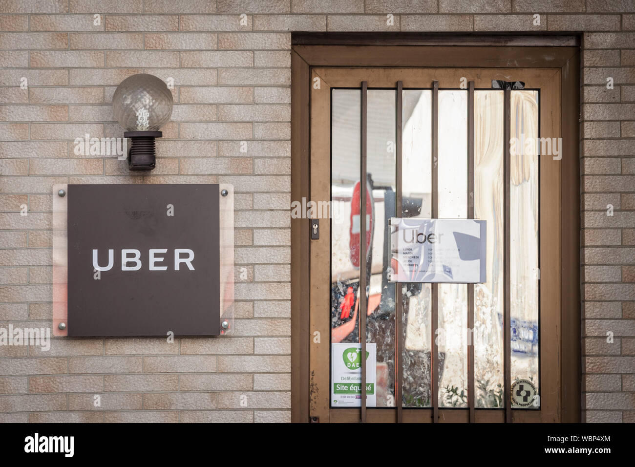 LYON, FRANCE - JULY 17, 2019: Uber Technologies logo on their office in Lyon. Uber is an American multinational transportation network company offerin Stock Photo