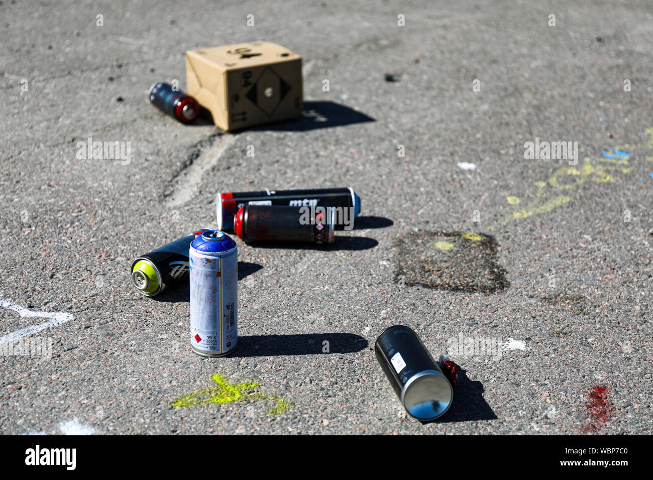 Empty spray paint cans discarded by graffiti artists Stock Photo Alamy