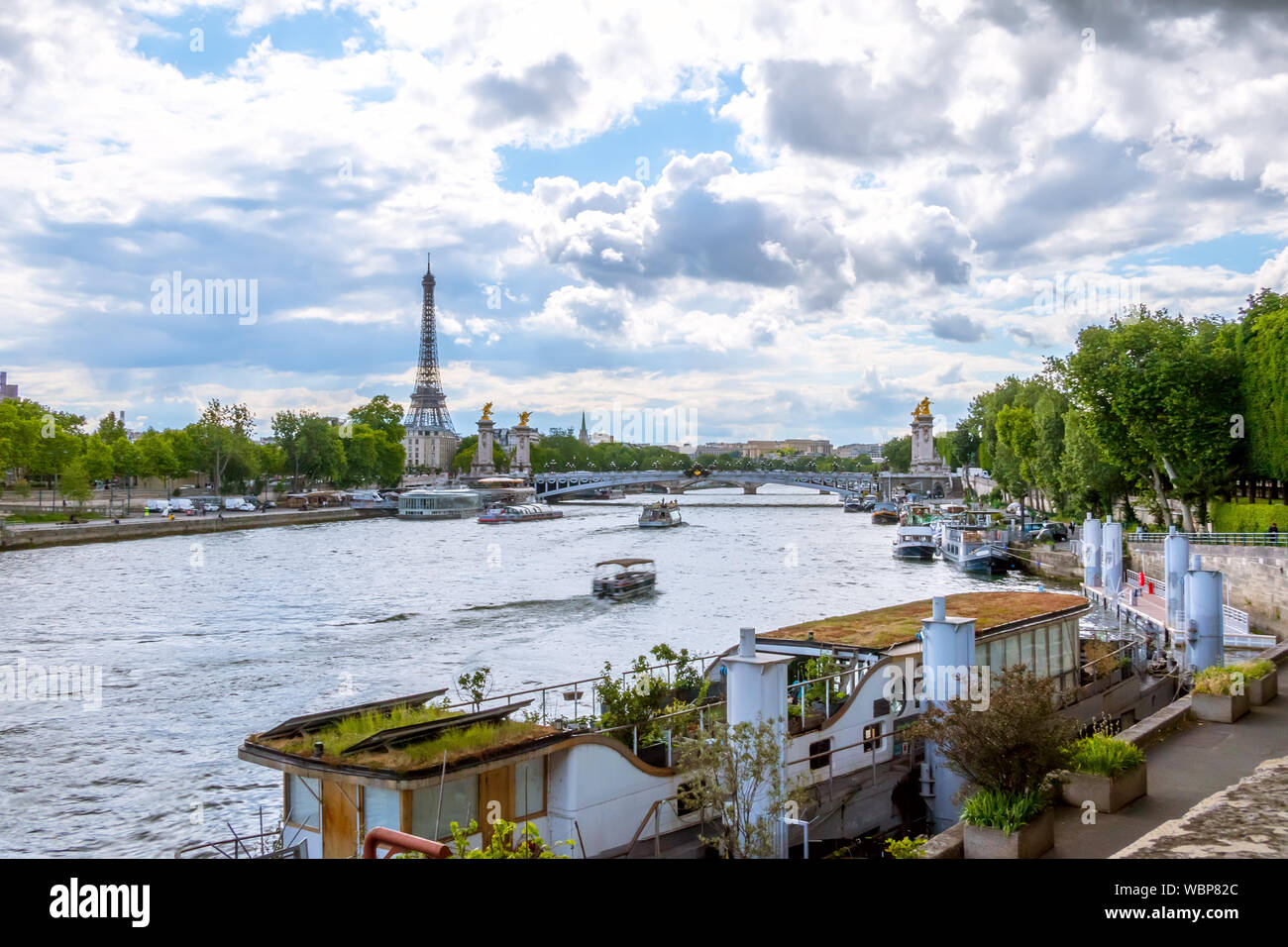 France. Paris. Sunny summer day. Water traffic on the River Seine with a view of the Eiffel Tower Stock Photo