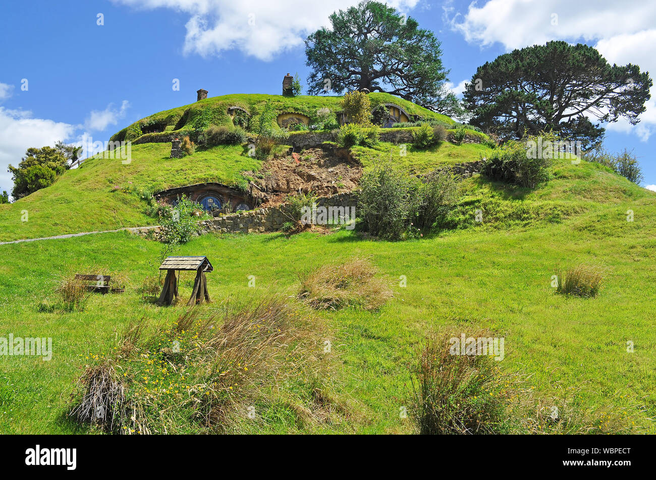Scenic View Of Grassy Hill Against Sky At Matamata Stock Photo