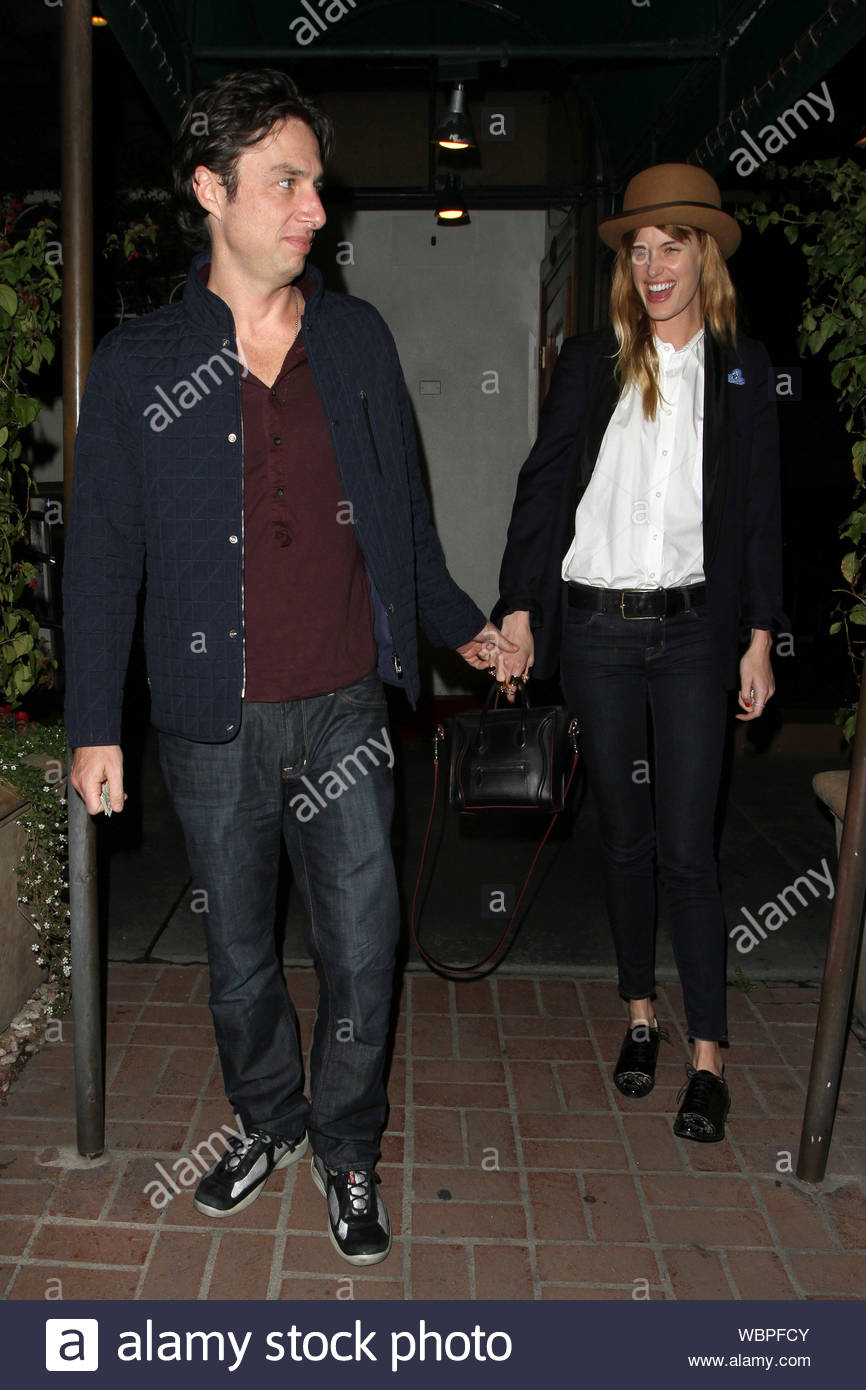 maroon shirt blue jeans