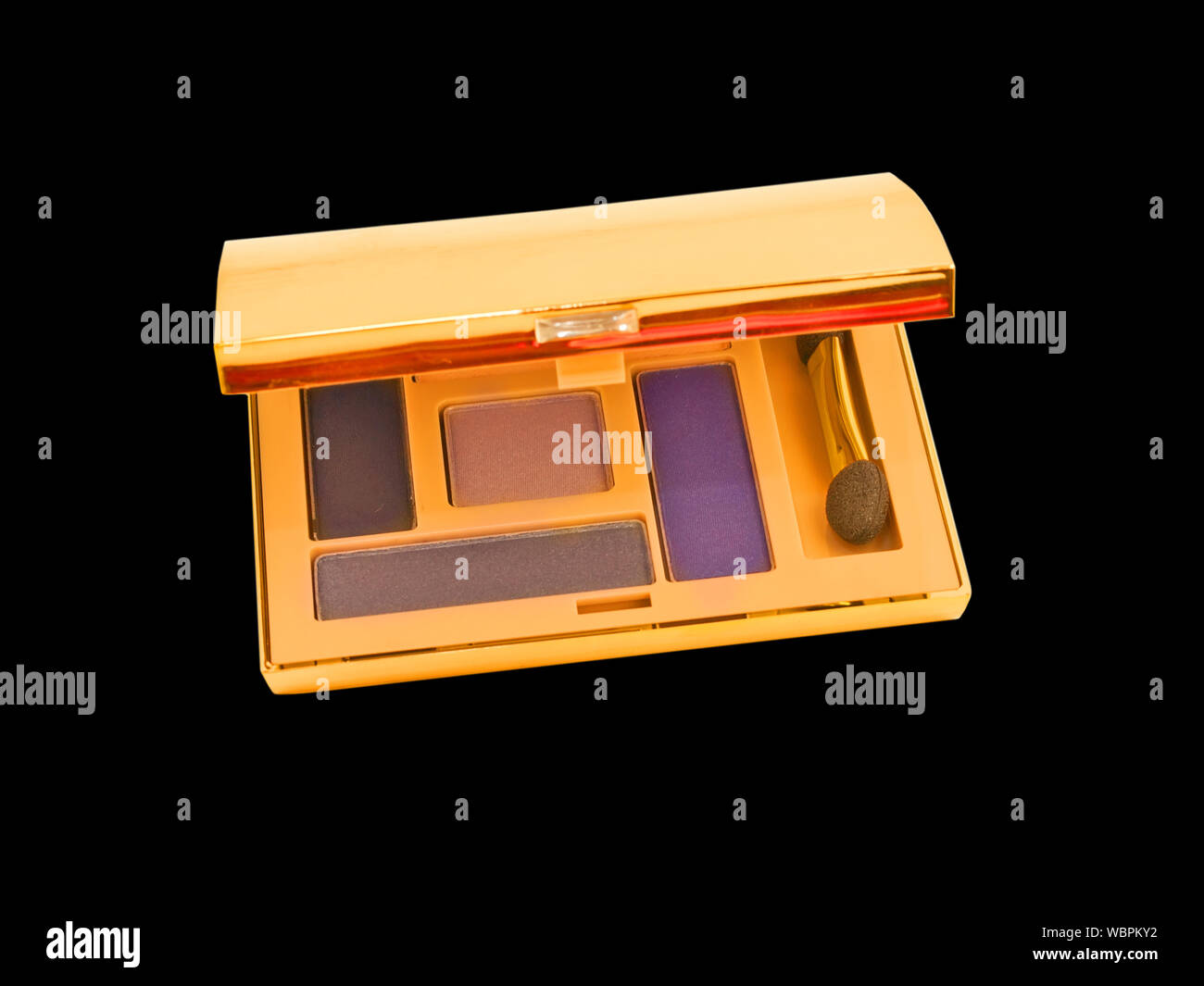 High Angle View Of Eyeshadow Against Black Background Stock Photo