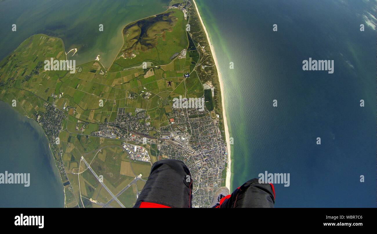 Low Section Of Person Skydiving Stock Photo
