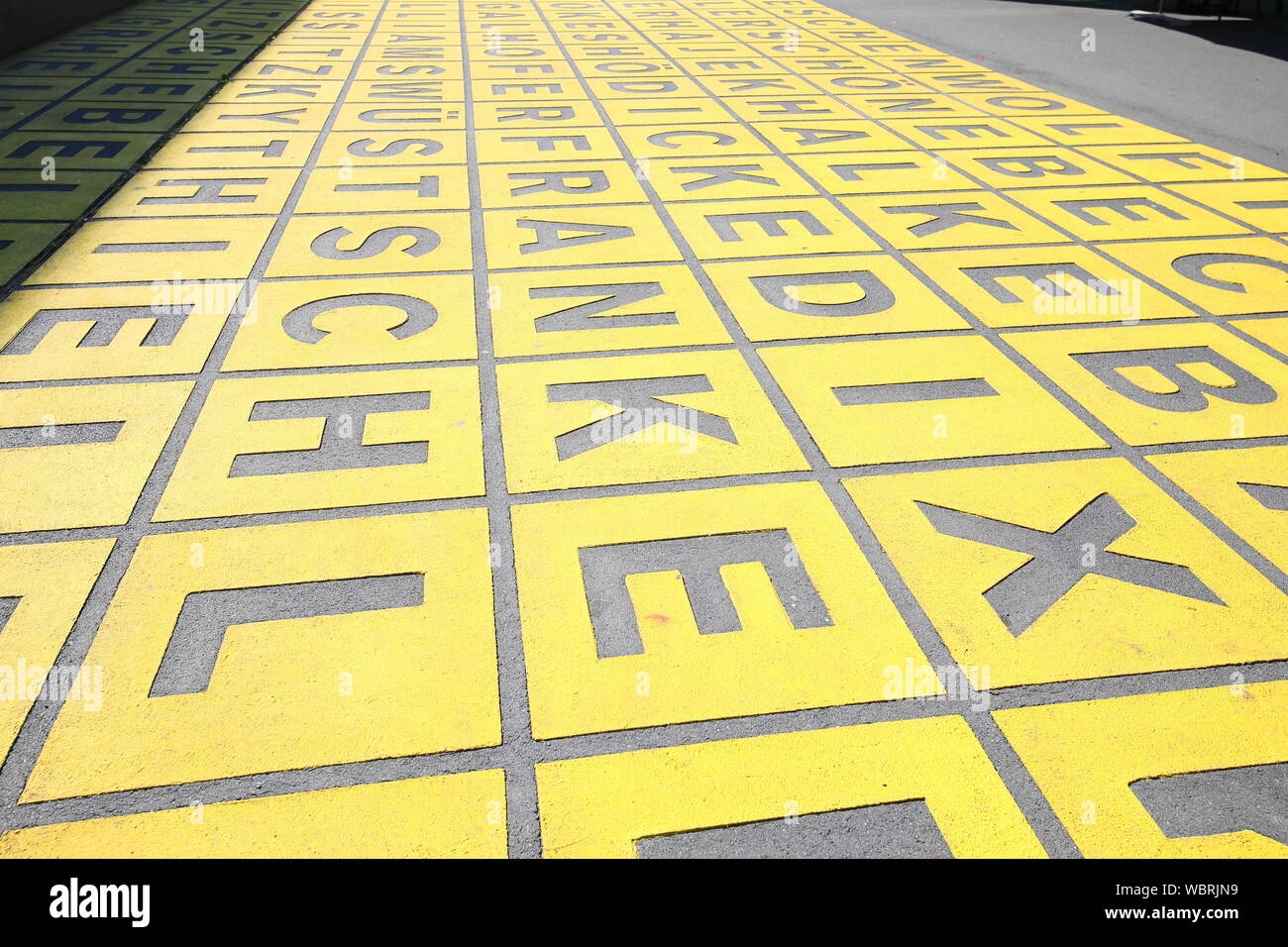 Alphabet lined in yellow background Stock Photo - Alamy