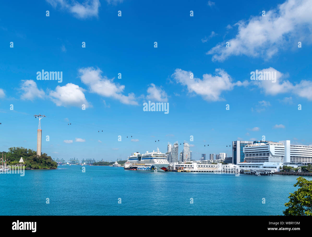 Cruise ship in the harbour at Singapore with the Sentosa Island Cable Car above, Harbourfront, Singapore City, Singapore Stock Photo