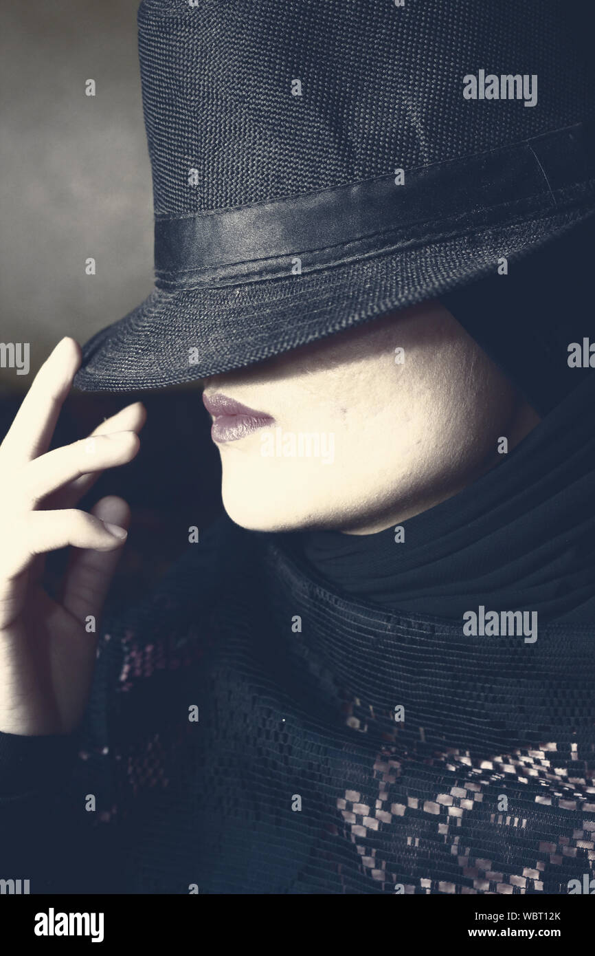 Man With Hat Covering His Face Stock Photo, Picture And Royalty Free Image