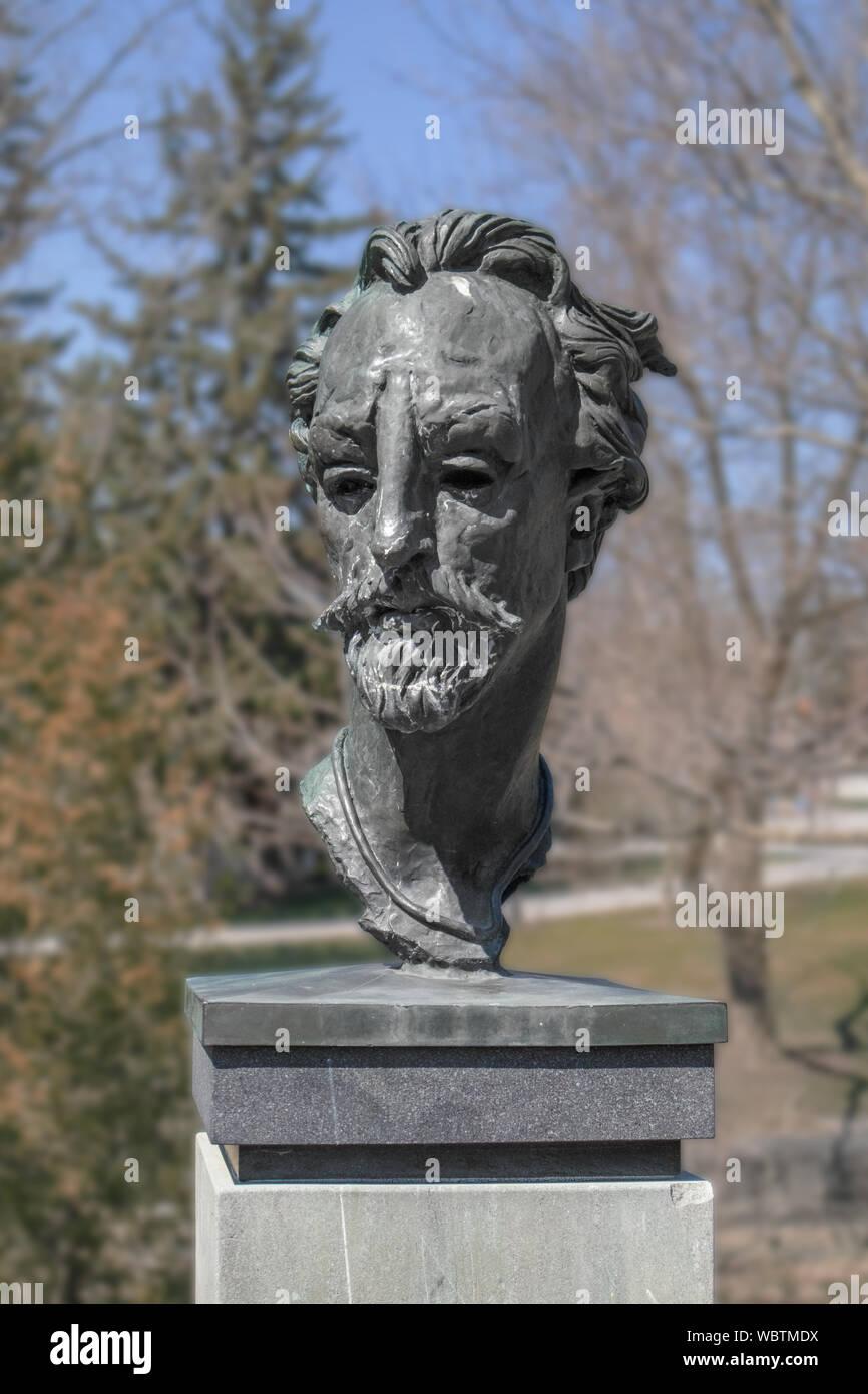 The sculpted portrait in the garden that bears his name: "Shakespeare Garden" in Stratford, Ontario. Stock Photo