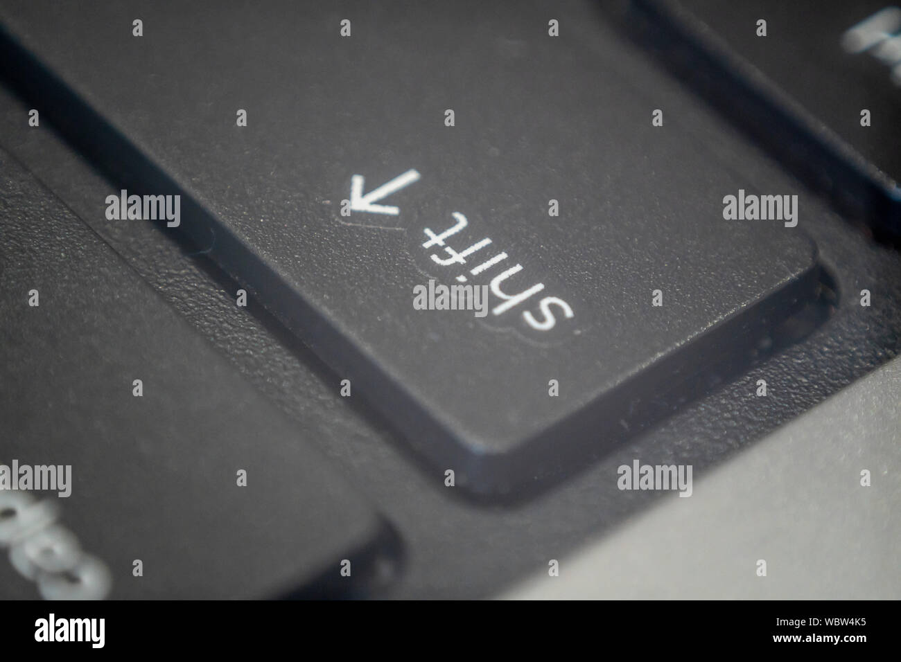 Extreme macro of the shift key on a laptop keyboard Stock Photo - Alamy