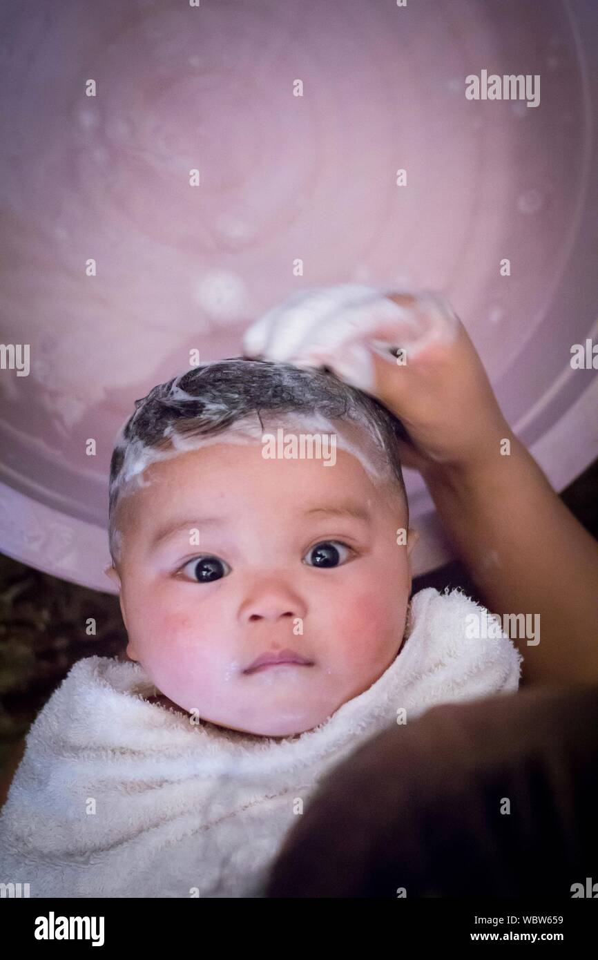 Mother bathing baby home hires stock photography and images Alamy
