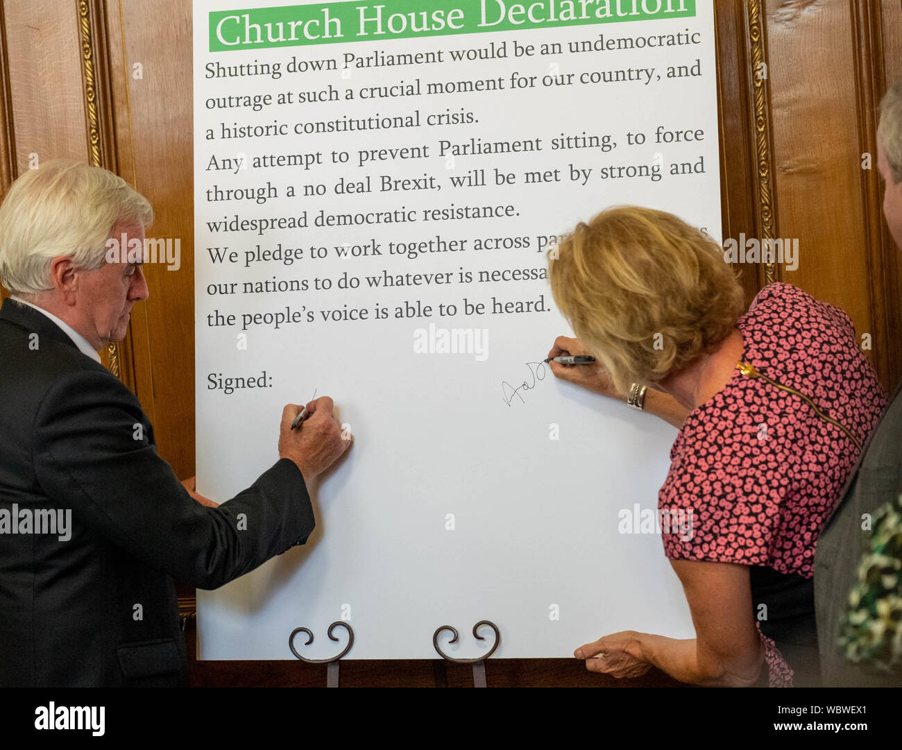 London, UK. 27 August 2019.  Church House declaration meeting of UK opposition leaders and MP's signing a declaration against the shutting down of parliament by Boris Johnson MP PC Prime Minister. John McDonnell MP Shadow Chancellor and Anna Soubry MP sign the Declaration  Credit Ian DavidsonAlamy Live News Stock Photo