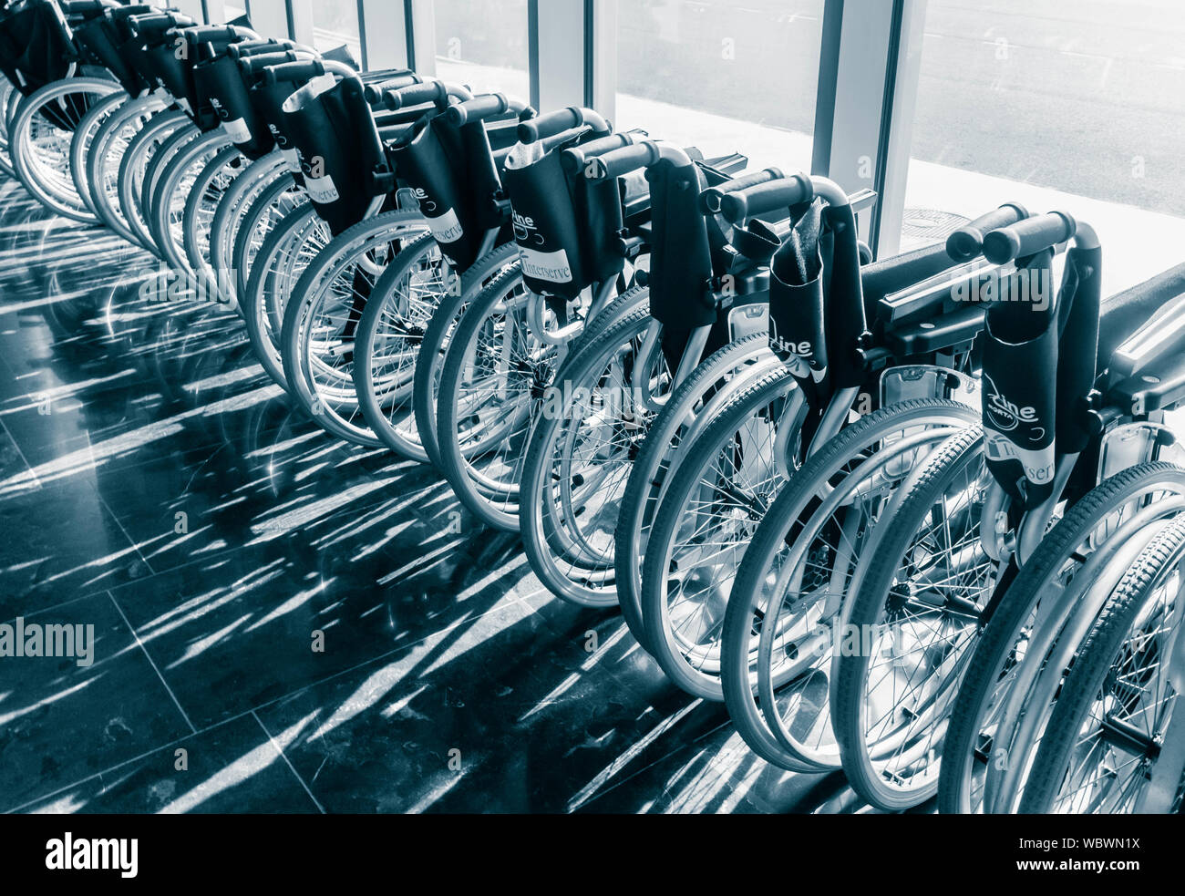 Airport wheelchairs hires stock photography and images Alamy