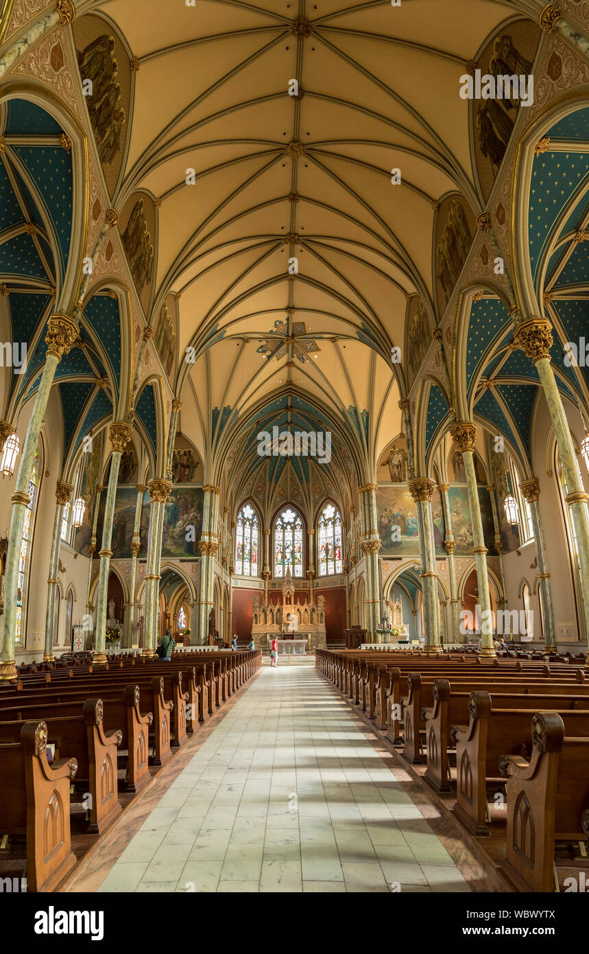 SAVANNAH, GEORGIA - November 30, 2016 : Interior of St John the Baptist cathedral on September 5, 2016. The Cathedral was founded around 1791 by the f Stock Photo