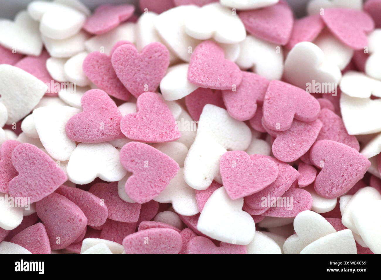 Full Frame Shot Of Heart Shaped Sweet Candies Stock Photo