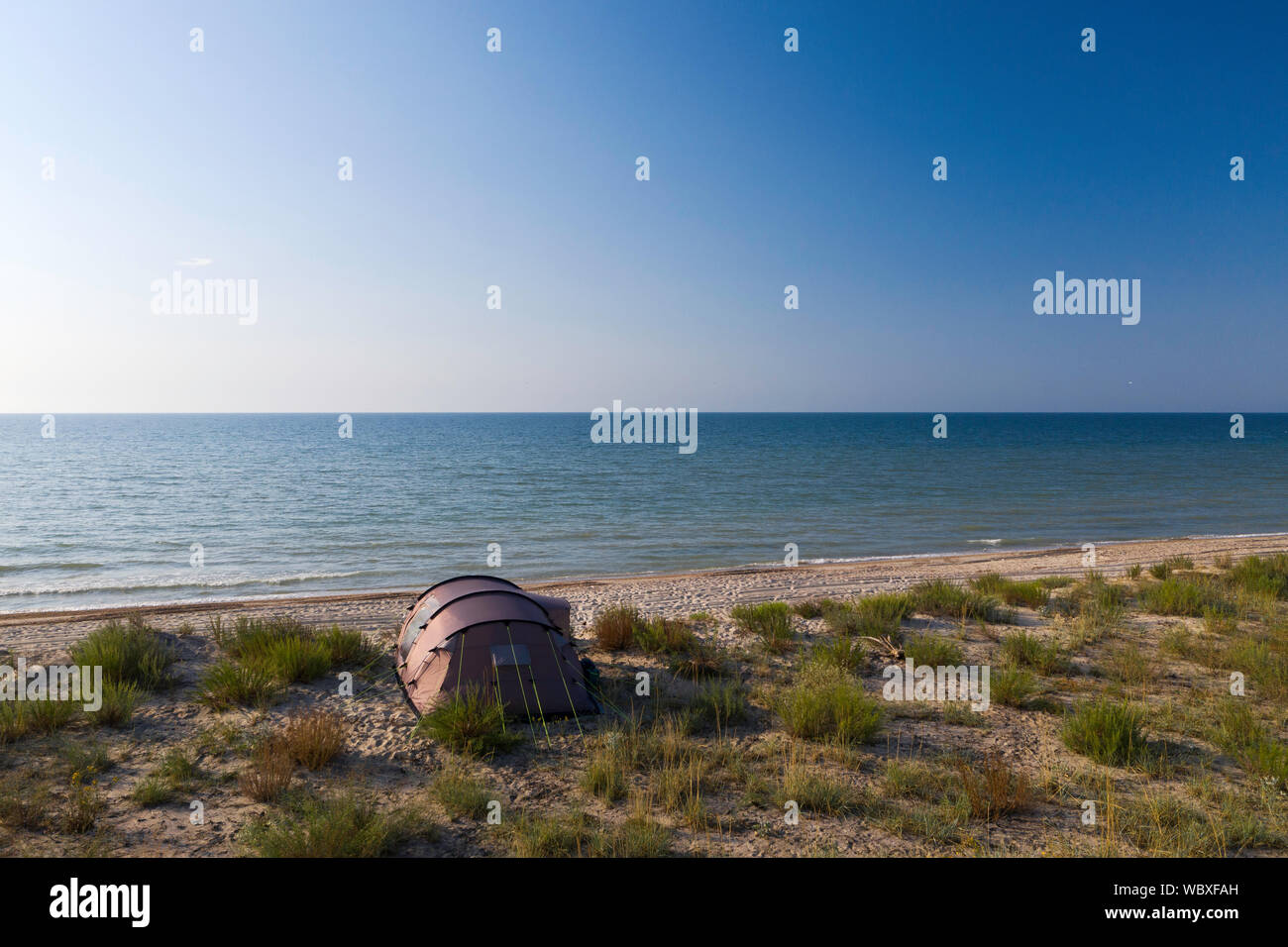 a camping tent on a beach near Black sea at a sunny day Stock Photo