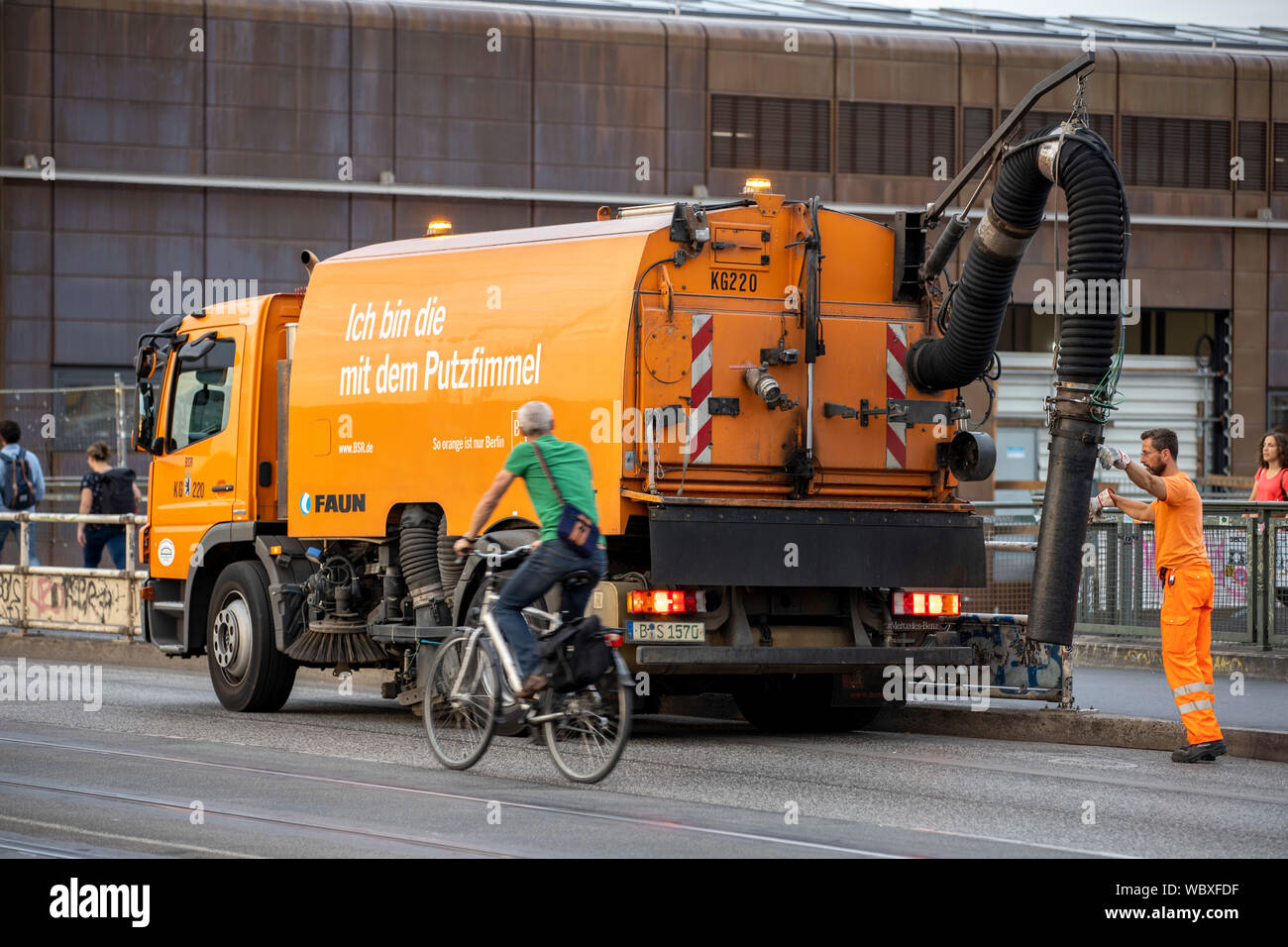 Street cleaning vehicle, at the railway station Warschauer Strasse, Berlin, Stock Photo