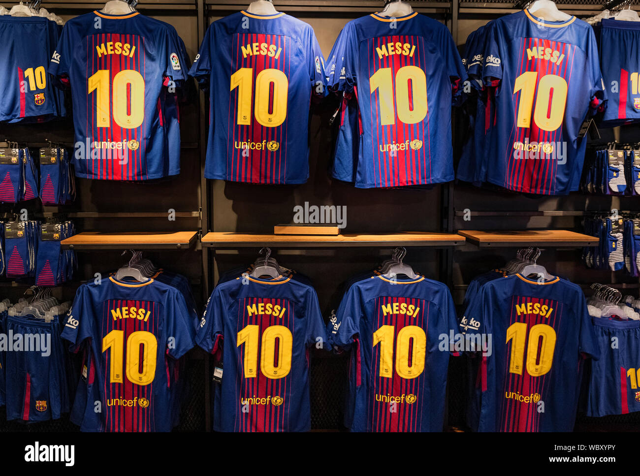 Popular Messi jerseys dominate the Camp Nou store, Barcelona, Spain. Stock Photo