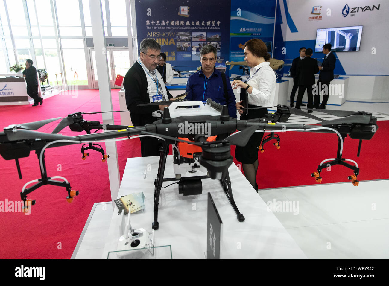 Moscow, Russia. 27th Aug, 2019. People view DJI agricultural drone during  the international aviation and space salon MAKS 2019 in Zhukovsky, Russia,  Aug. 27, 2019. The air show kicked off on Tuesday.