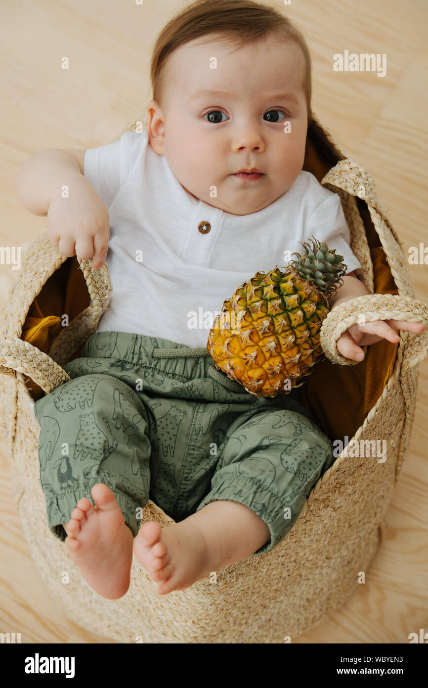 Pineapple in a basket hires stock photography and images Alamy