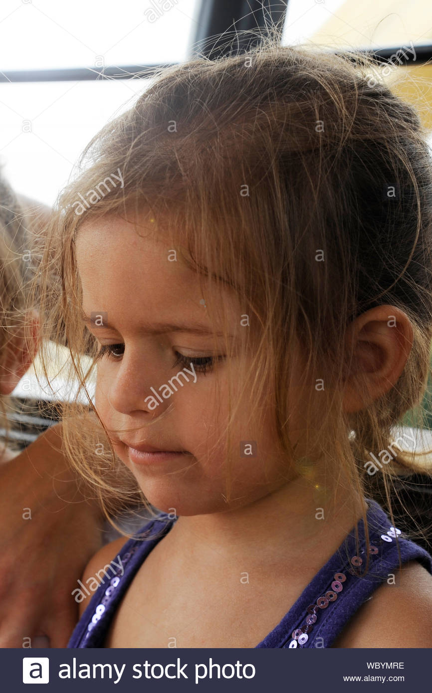 Child Portrait Of Cute Blonde Little Girl With Disheveled Messy