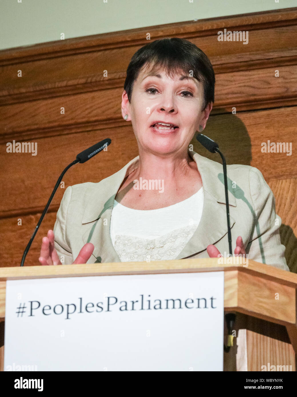 London, UK. 27th Aug, 2019. Caroline Lucas, The Green Party, speaks. Cross-party MPs and opposition party leaders assemble in the historic location of Church House in London to sign their 'Church House Declaration', with the intend to stop Parliament from being shut down by the government. Attendees include Lib Dem leader Jo Swinson, Labour Shadow Cabinet members John McDonnell and Sir Kier Starmer, the Green Party's Caroline Lucas, SNP's Ian Blackford and many others. Up to around 160 MPs are thought to have signed the declaration in total. Credit: Imageplotter/Alamy Live News Stock Photo