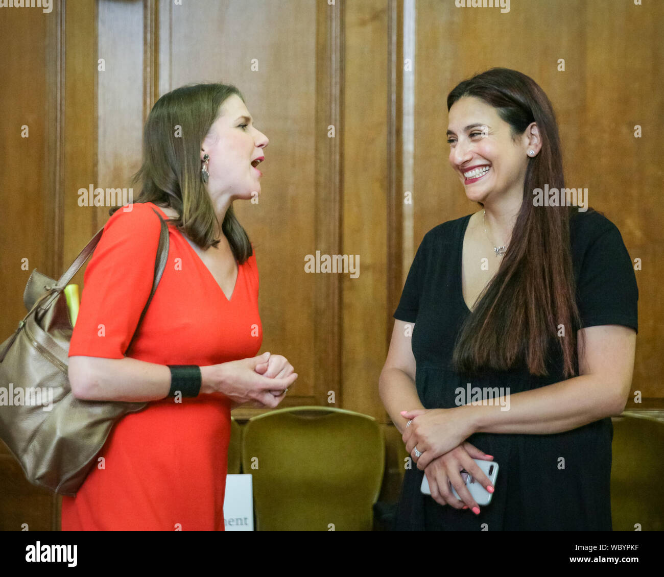 London, UK. 27th Aug, 2019. Lib Dem leader Jo Swinson chats to Luciana Berger, MP. Cross-party MPs and opposition party leaders assemble in the historic location of Church House in London to sign their 'Church House Declaration', with the intend to stop Parliament from being shut down by the government. Attendees include Lib Dem leader Jo Swinson, Labour Shadow Cabinet members John McDonnell and Sir Kier Starmer, the Green Party's Caroline Lucas, SNP's Ian Blackford and many others. Up to around 160 MPs are thought to have signed the declaration in total. Credit: Imageplotter/Alamy Live News Stock Photo
