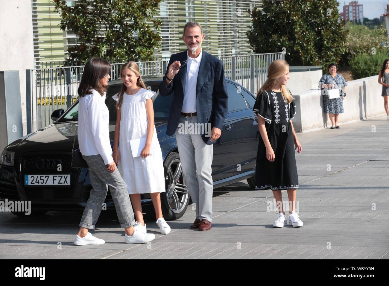 Madrid, Spain. 27th Aug, 2019. Madrid Spain; 08/27/2019.- Felipe VI and Letizia Kings of Spain accompanied by their daughters Princess Leonor and the Infanta Sofia arrive at the hospital to visit King Juan Carlos I, who is recovering from an open heart operation. Credit: dpa picture alliance/Alamy Live News Stock Photo