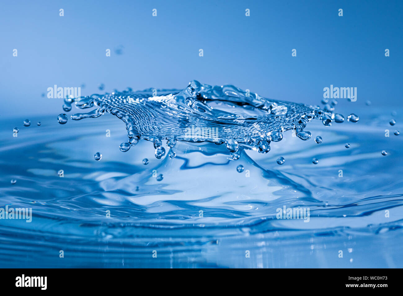 Water drop collision with abstract effect Stock Photo - Alamy