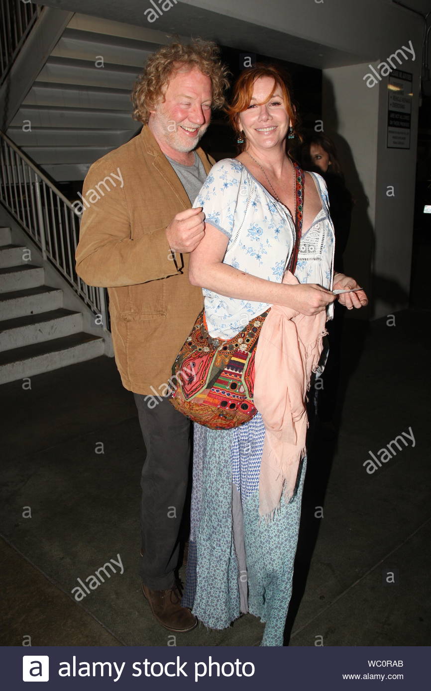 Los Angeles, CA - Melissa Gilbert and new husband Timothy Busfield pose up  for the camera as