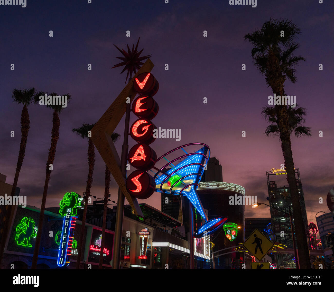 'Vegas' neon sign with martini glass and palm trees,on Fremont Street in Las Vegas, Nevada, at dusk. Stock Photo