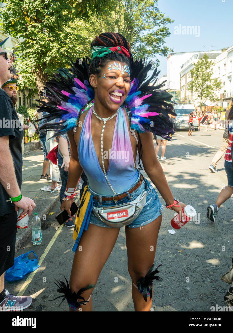 Happy confident lady at the Notting Hill Carnival London. Stock Photo
