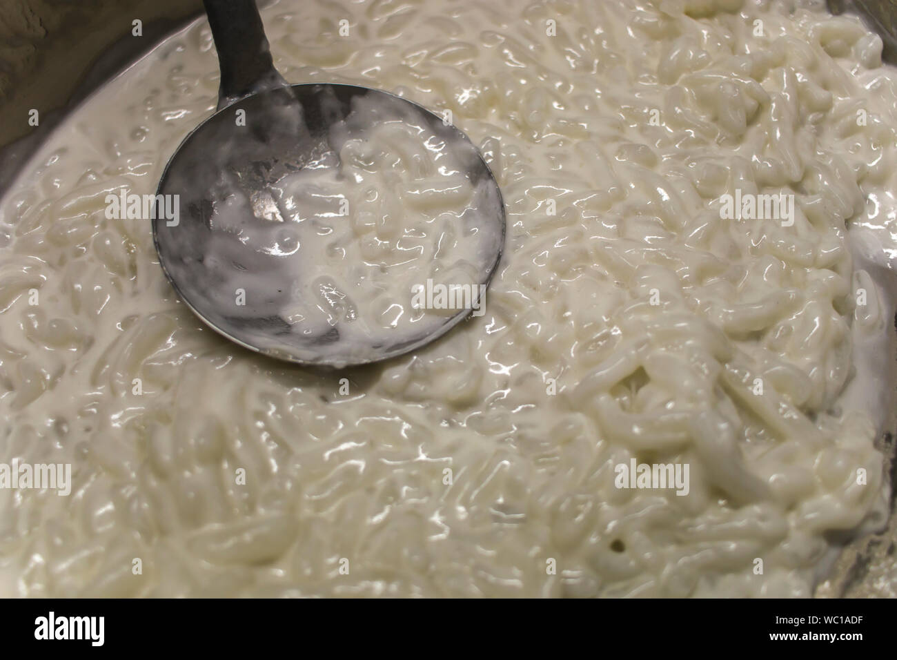 https://c8.alamy.com/comp/WC1ADF/thai-dessert-rice-noodles-made-of-rice-eaten-with-coconut-milk-in-the-big-pot-prepare-for-sell-in-market-high-resolution-image-gallery-WC1ADF.jpg