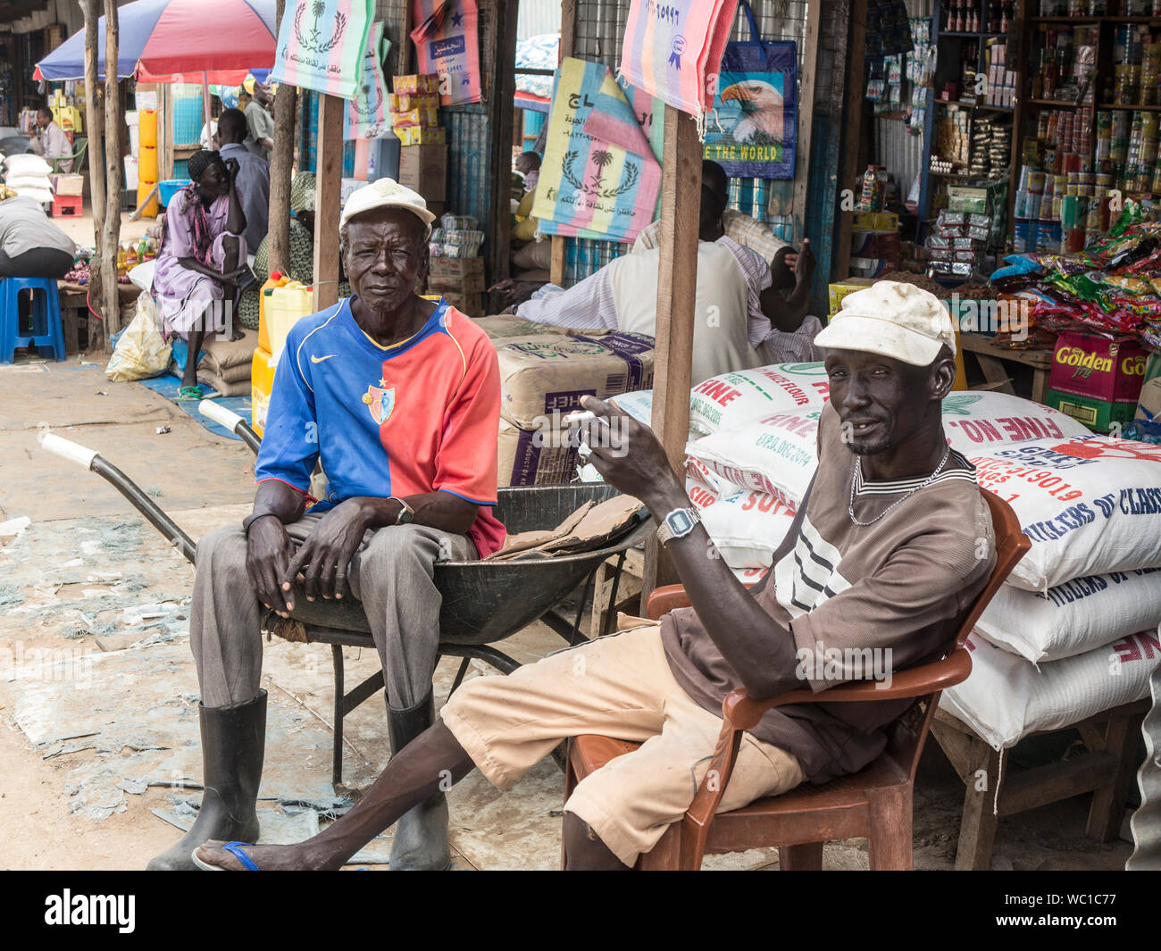 BOR, SOUTH SUDAN-OCTOBER 30, 2013: Unidentified men sell their goods at
