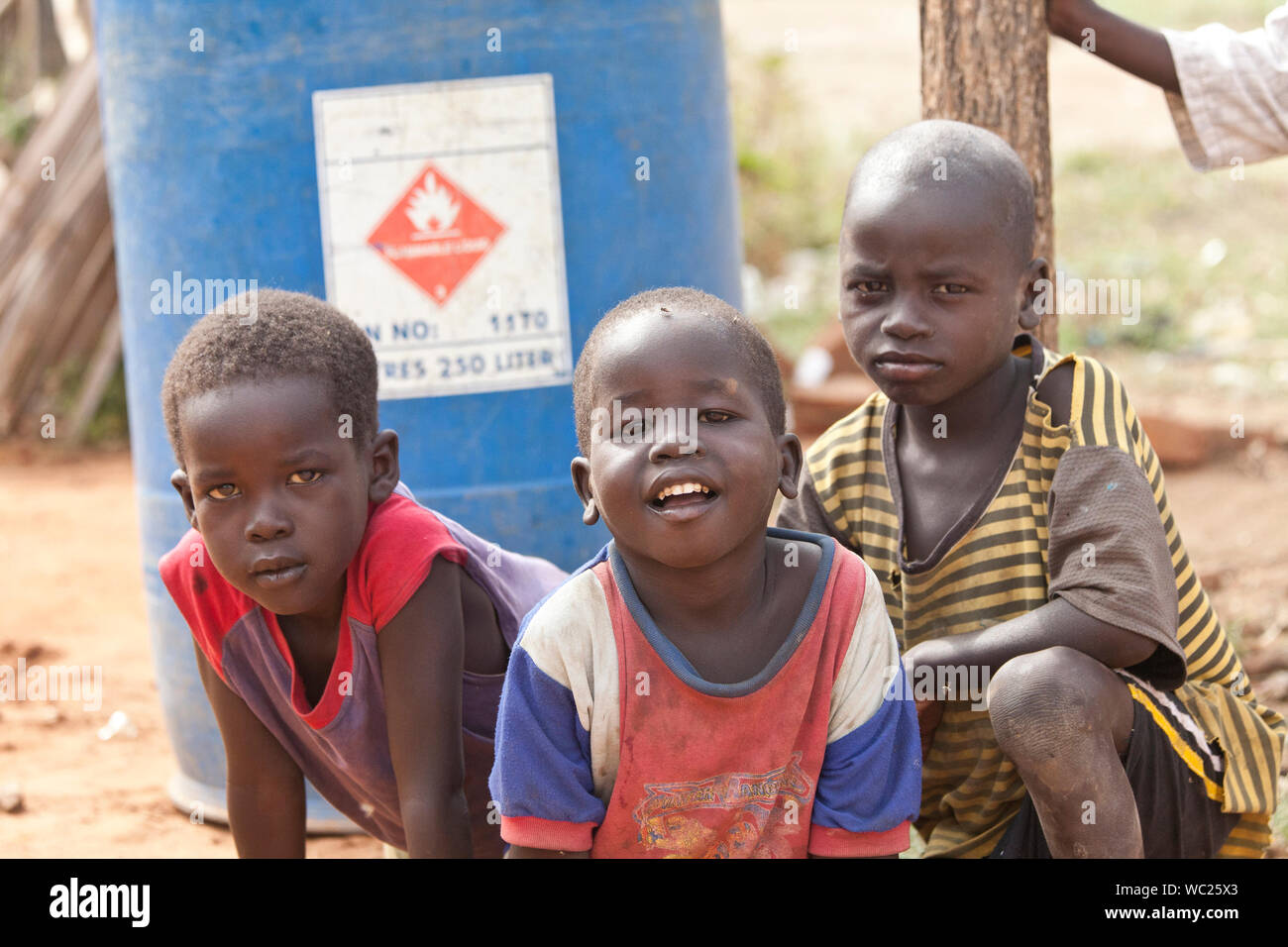 TORIT, SOUTH SUDAN-FEBRUARY 21, 2013: Unidentified children play in the village of Torit, South Sudan Stock Photo