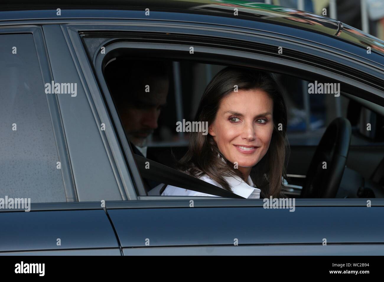 Madrid, Spain. 27th Aug, 2019. Letizia queen spain.Felipe VI and Letizia Reyes de España speak with the press accompanied by their daughters Princess Leonor and the Infanta Sofia in the hospital after visiting King Juan Carlos I, who is recovering from an open heart operation. Credit: dpa picture alliance/Alamy Live News Stock Photo