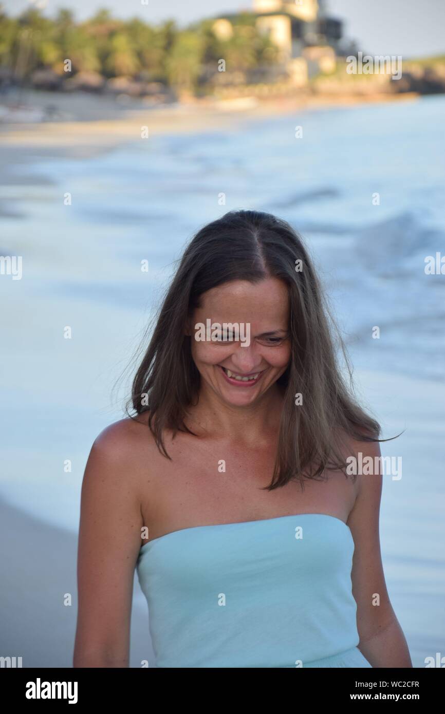 Mature woman fun beach hi-res stock photography and images - Alamy