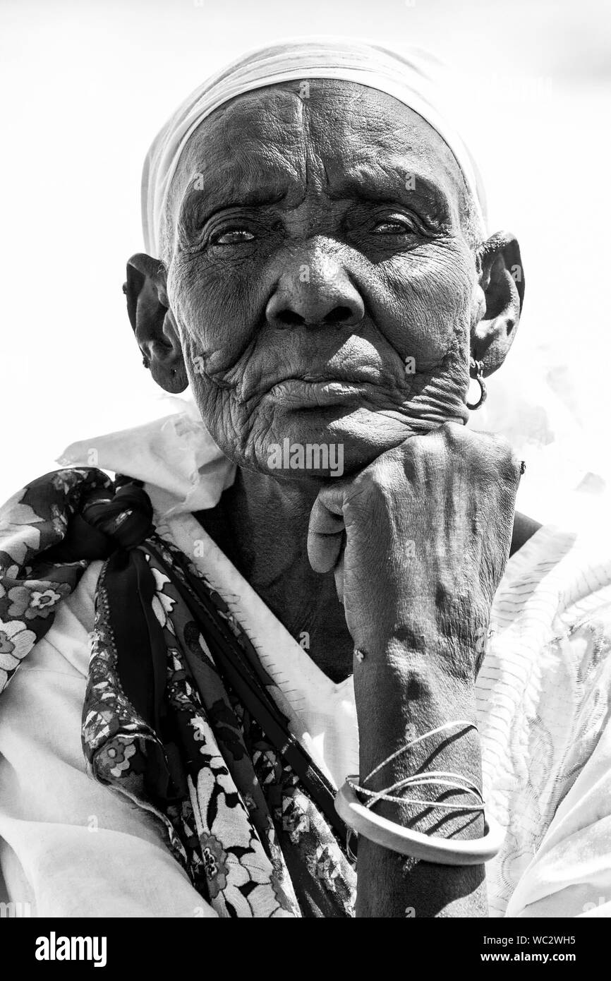 elderly woman showing years of war on her face, Southern Sudan Stock Photo